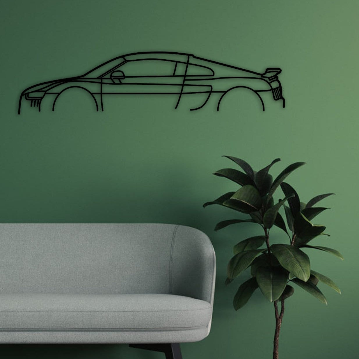 Audi R8 silhouette wall art displayed on a green wall.