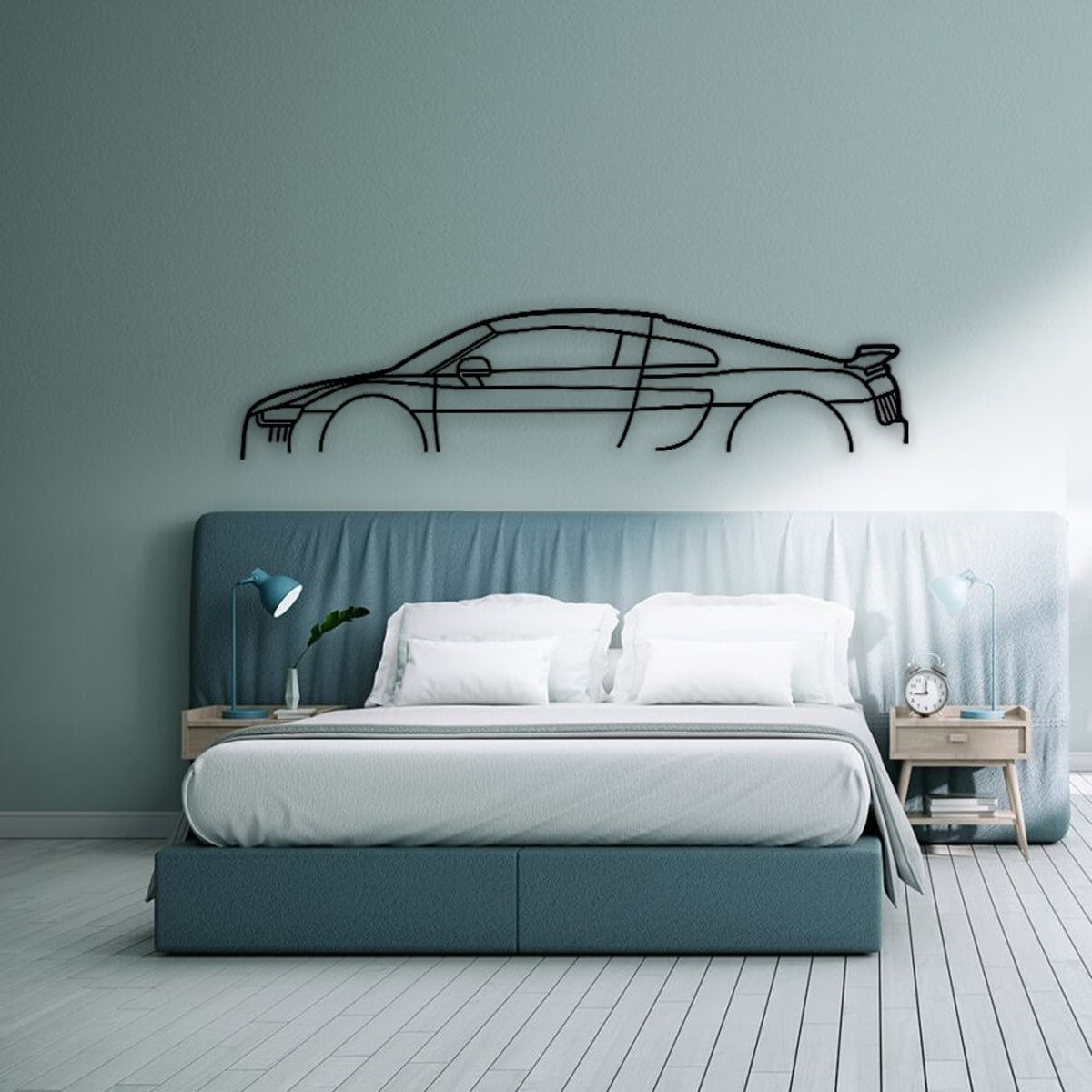 Audi R8 silhouette metal wall art displayed above a bed.