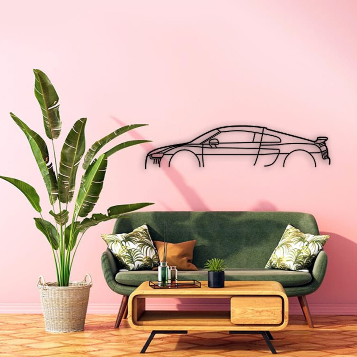 Audi R8 car silhouette wall art displayed on a pink wall.