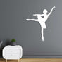 White metal wall art of a ballerina in a graceful pose, styled on a dark gray wall for a contemporary interior.