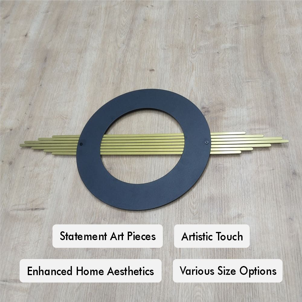 Contemporary black and gold metal wall sculpture with a modern geometric design.