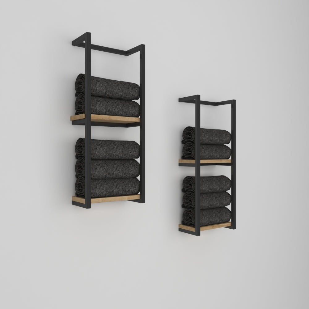 Sleek black metal wall-mounted towel shelves with a light wood base, neatly holding dark gray towels, displayed against a clean white background