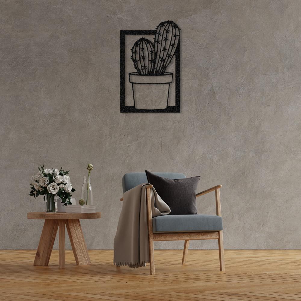 A cozy and elegant office setting with a white desk, a modern chair, and a black "Cactus in Vase" metal wall art on a white wall, adding a touch of nature to the workspace. 