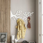 White cherry flower hanger wall hook with floral metal design.