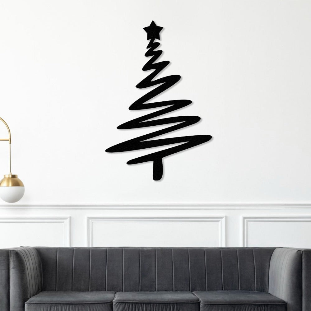 Black Christmas Tree with Star Metal Wall Art in a living room