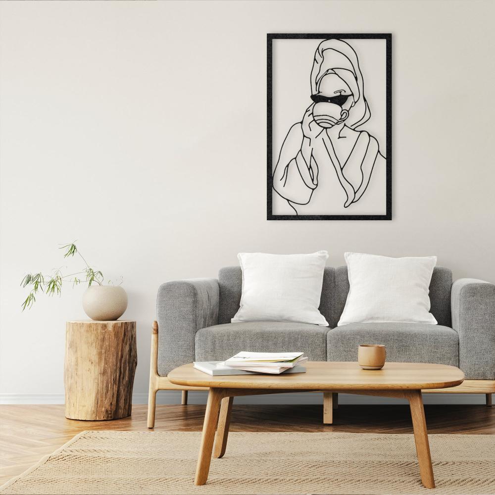 Lady with Coffee Metal Wall Art in a living room