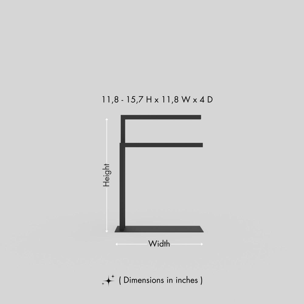 A dimensional diagram of a black countertop towel holder, providing precise height, width, and depth measurements in inches, showcasing its compact and efficient design.. This diagram is labelled in inches; centimetre values are shown beside the image.
