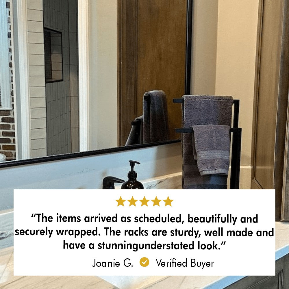 Countertop Towel Holder displayed on a bathroom counter with folded hand towels.