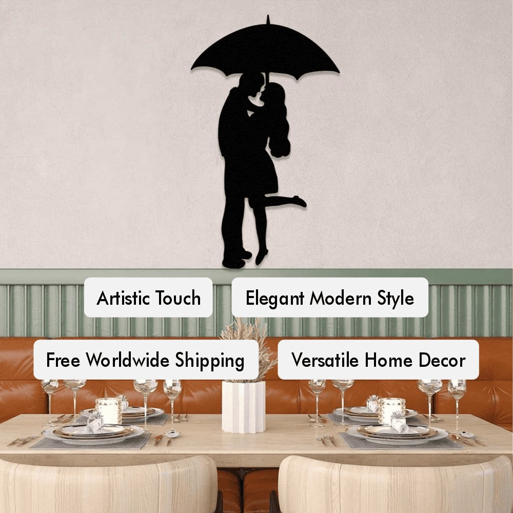 A metal wall art piece depicting a couple under an umbrella, mounted above a dining area in a modern interior.