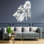 Darth Vader metal wall art in a striking white design, mounted on a deep blue paneled wall above a luxurious green velvet sofa. The room is accented with white pillows, a wooden coffee table, and a vibrant potted plant, creating a sophisticated and modern living space.