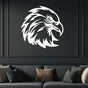 White eagle head metal wall art mounted on a dark green wall above a sofa, creating a bold and modern statement