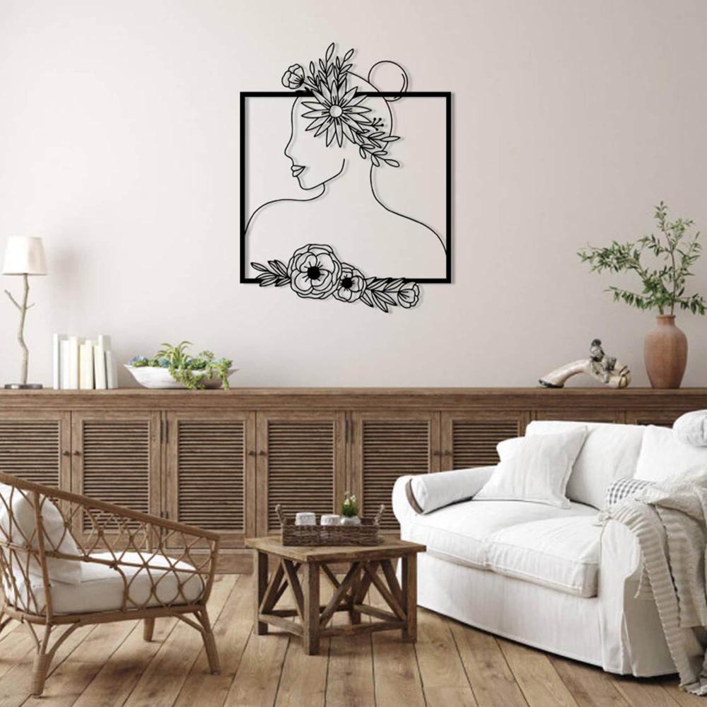 Floral Woman Silhouette Metal Wall Art in a bedroom