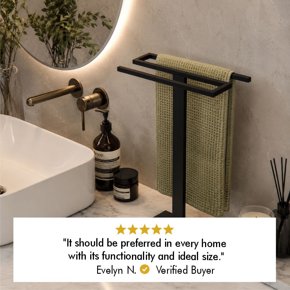 Five-star customer review from verified buyer Evelyn N. saying the countertop towel holder is functional and ideally sized.
