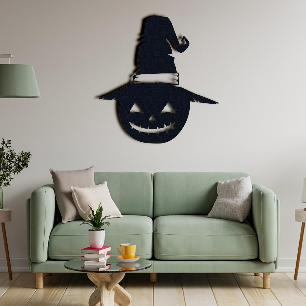Black Halloween Jack-o-Lantern Metal Wall Art in a living room