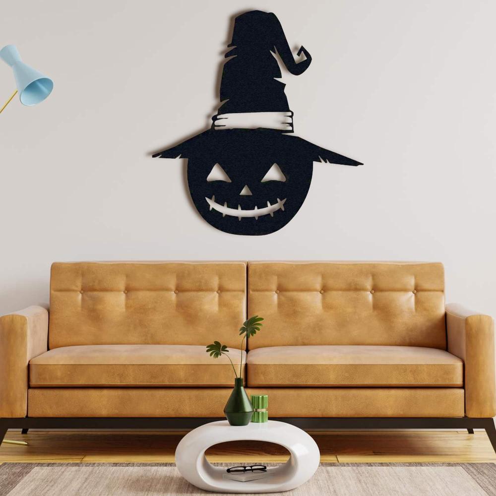 Black Halloween Jack-o-Lantern Metal Wall Art in a living room