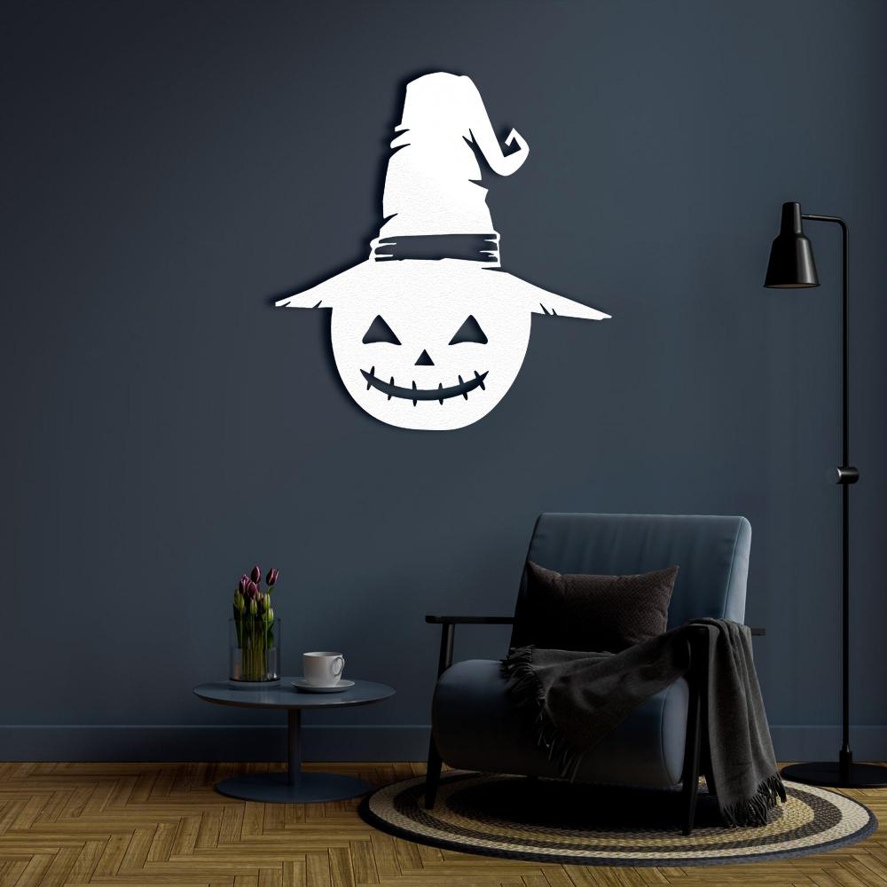 White Halloween Jack-o-Lantern Metal Wall Art in a living room