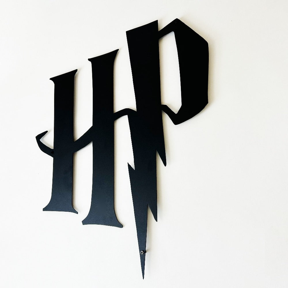 Close-up of black Harry Potter HP Logo Metal Wall Art details