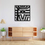 Lady with hat metal wall art in black, mounted above a stylish wooden console table, complemented by a modern pendant light, potted plants, and minimalist decor.
