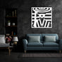Modern white metal wall art of a lady wearing a stylish hat, displayed against a dark textured wall above a teal sofa with matching cushions in a sophisticated living room.