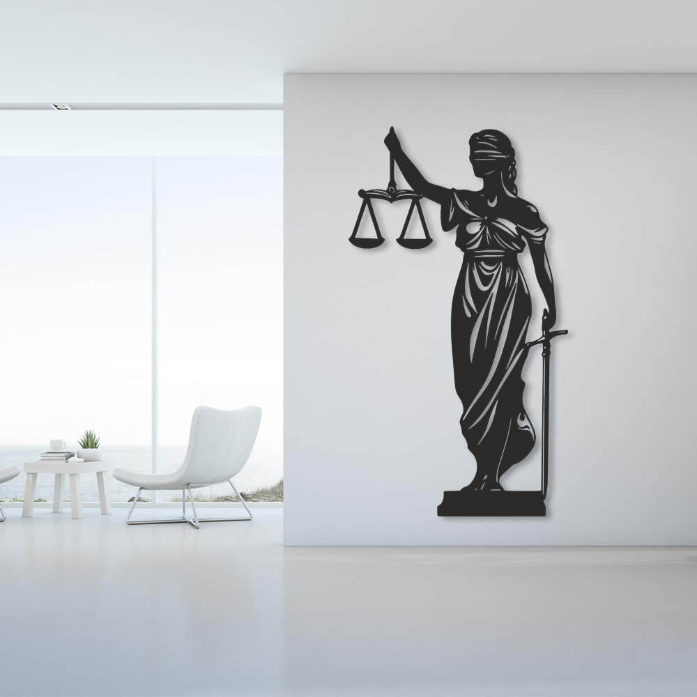 Decorative wall art of a woman holding scales and a sword in a modern room.