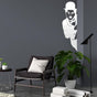 White Charlie Chaplin Metal Wall Art in a living room