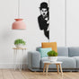 Black Charlie Chaplin Metal Wall Art in a living room