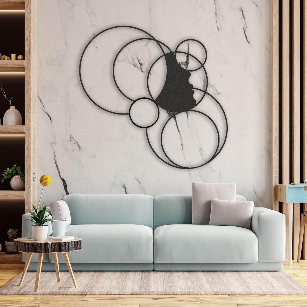 Black Girl and Circles Geometric Metal Wall Art in a living room