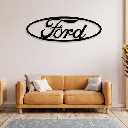 Metal FORD Sign Wall Art featuring a FORD wordmark in landscape format, mounted on a wall in a contemporary interior.