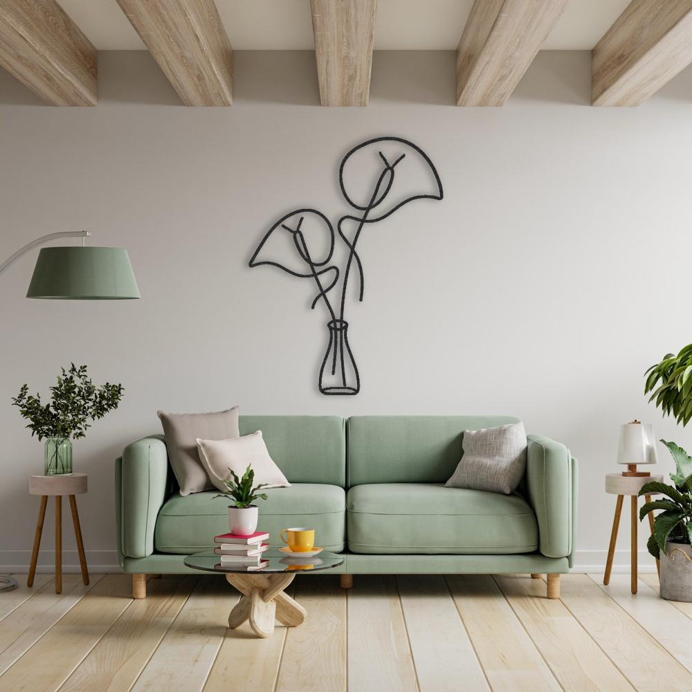 Black Leaves in Vase Metal Wall Art in a living room