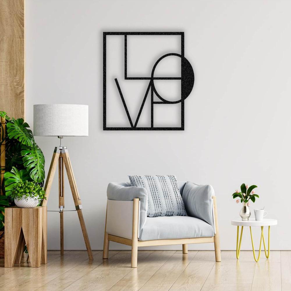 Black LOVE Letters Geometric Metal Wall Art in a living room