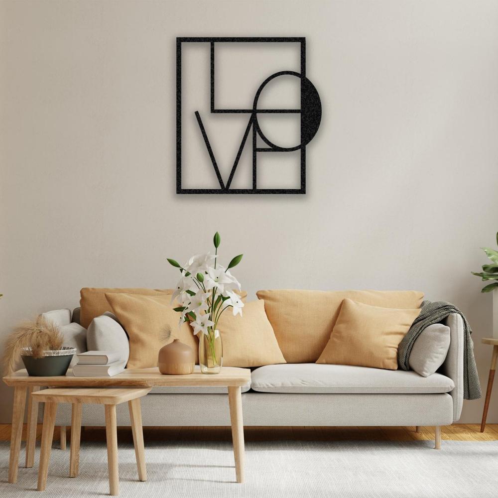 Black LOVE Letters Geometric Metal Wall Art in a living room