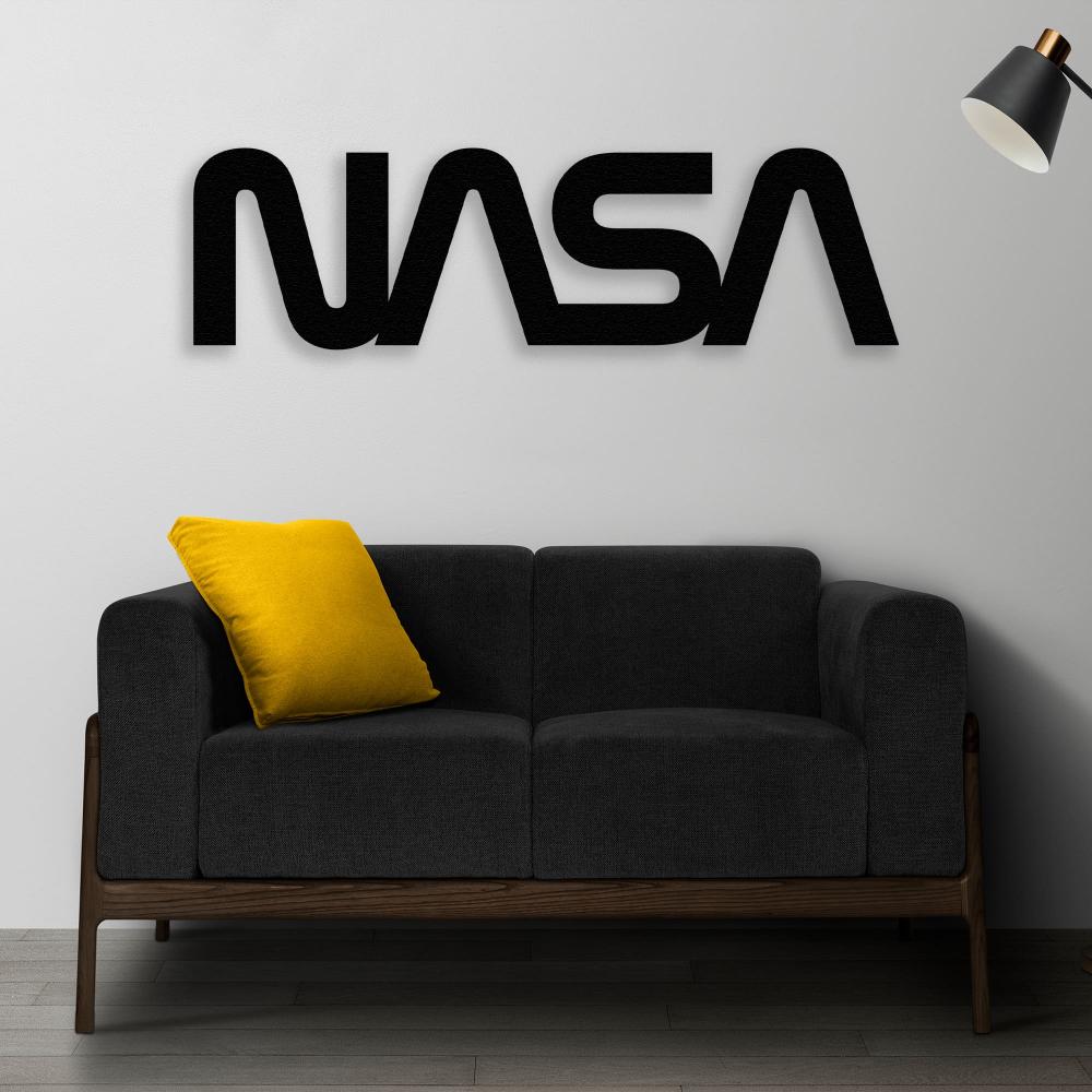NASA Sign Metal Wall Art in a living room