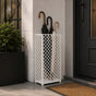 Modern white mesh metal umbrella stand on stone porch entrance with diamond grid pattern