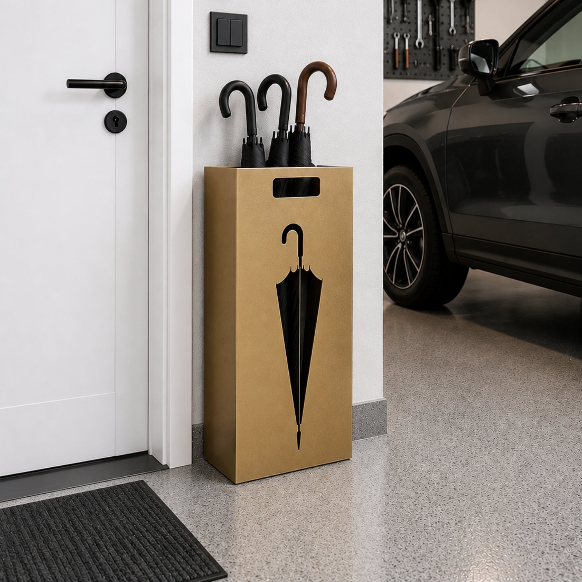 Modern gold metal umbrella stand with umbrella cutout design freestanding in luxury garage entryway