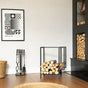 Modern living room with a fireplace and the Modern Metal Firewood And Kindling Storage holding firewood and kindling