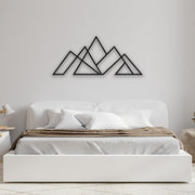 Geometric Mountain Range Metal Wall Art in a bedroom