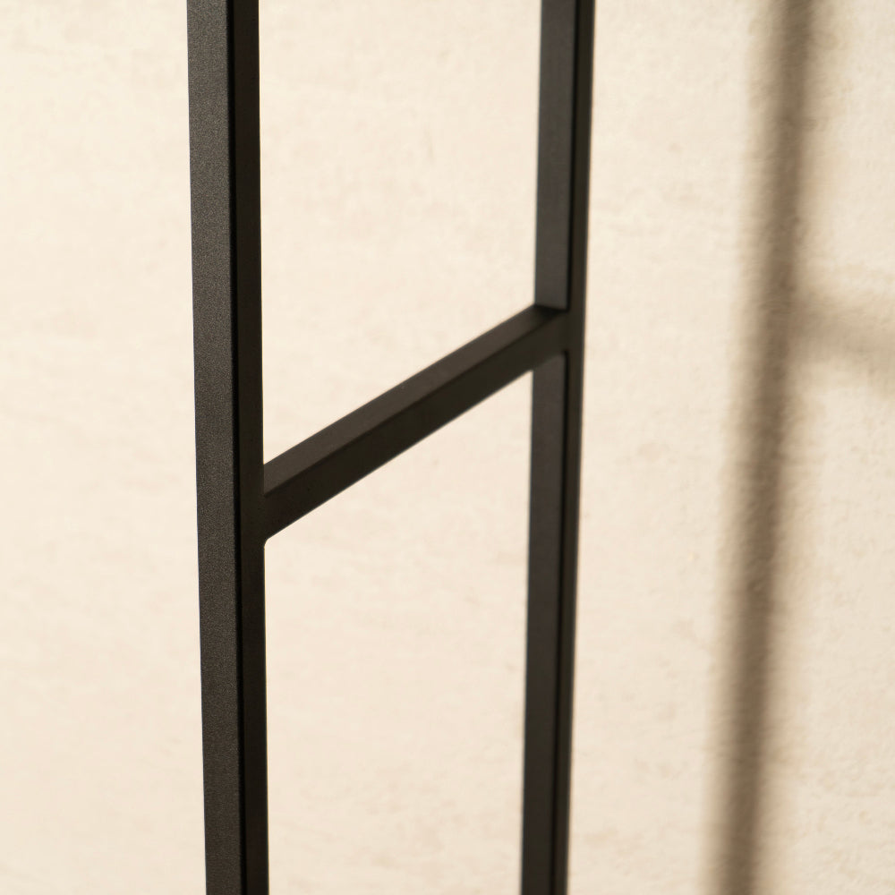 Black metal frame on a beige background