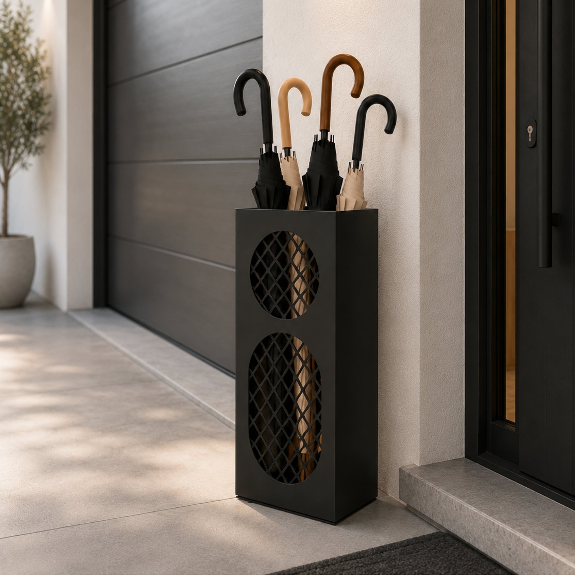 Black oval mesh metal umbrella stand alternate angle in modern garage entryway with porthole detail