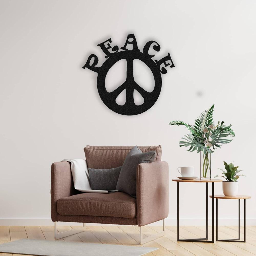 Peace Maker Lettering Metal Wall Art in a living room