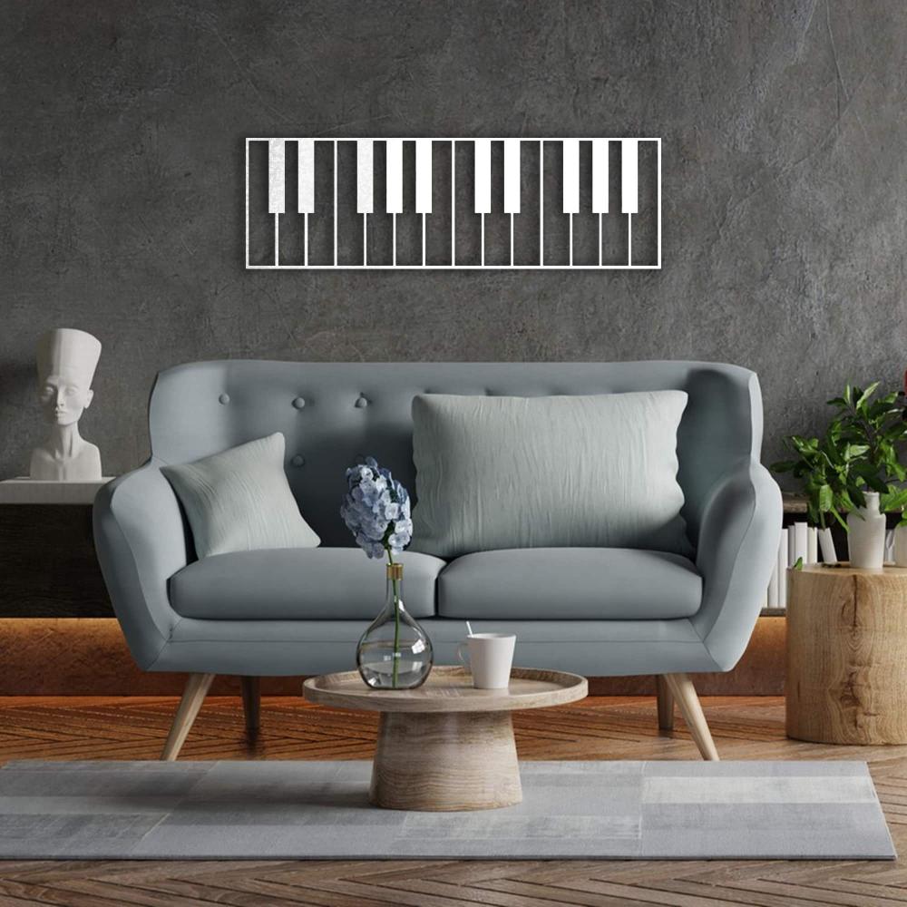 White Piano Is Life Music Metal Wall Art in a living room