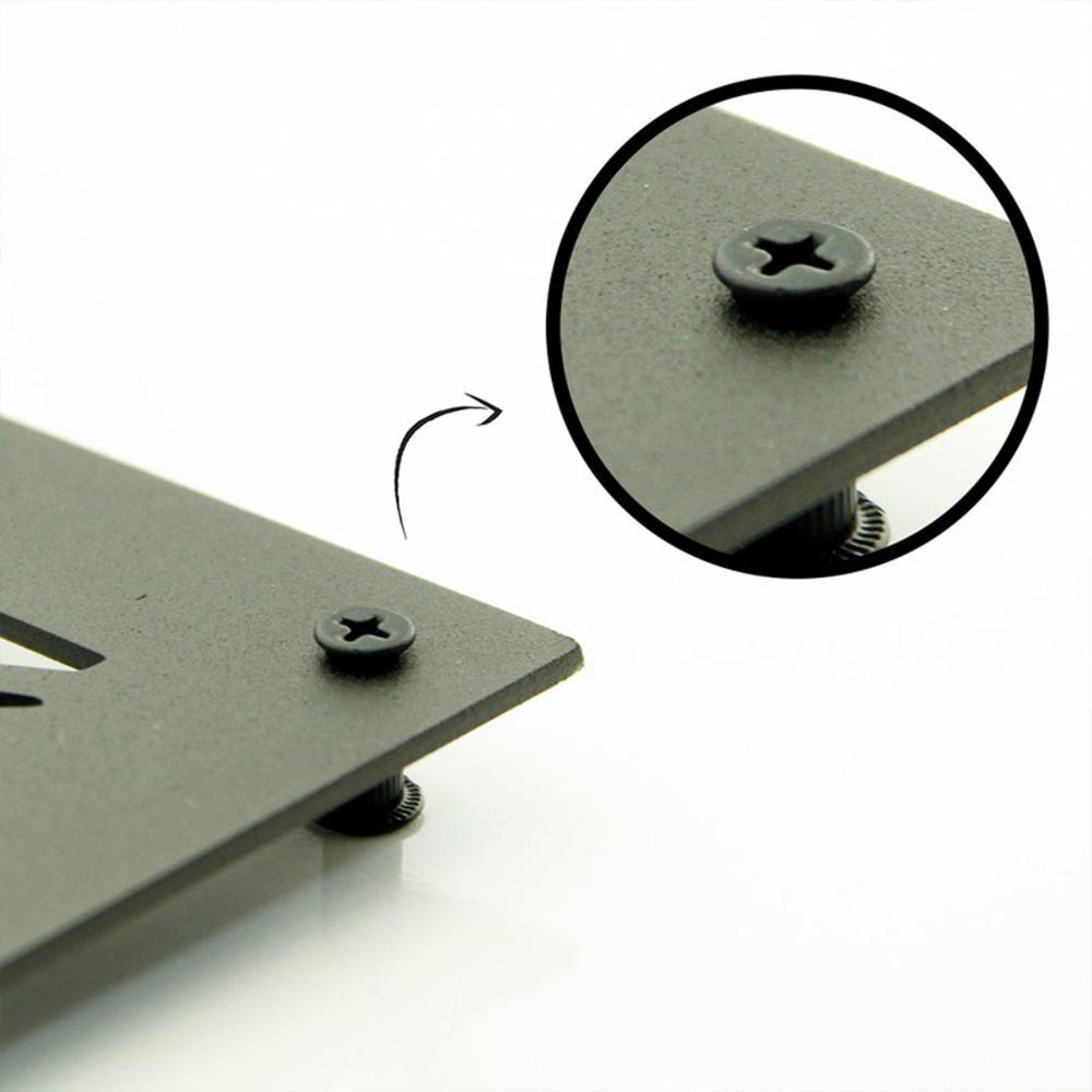 Close-up of a raised metal corner with a black screw, showcasing the sturdy installation and smooth finish.
