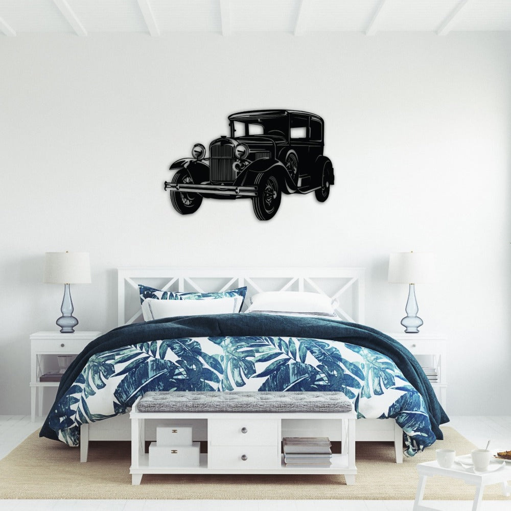 Retro car silhouette metal wall art displayed above a bed.