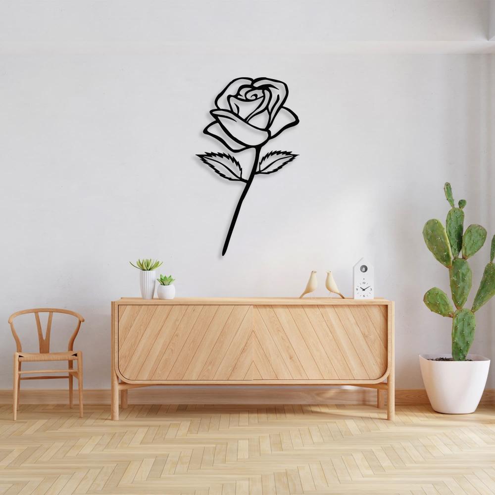 Black Rose Stem Metal Wall Art in a living room