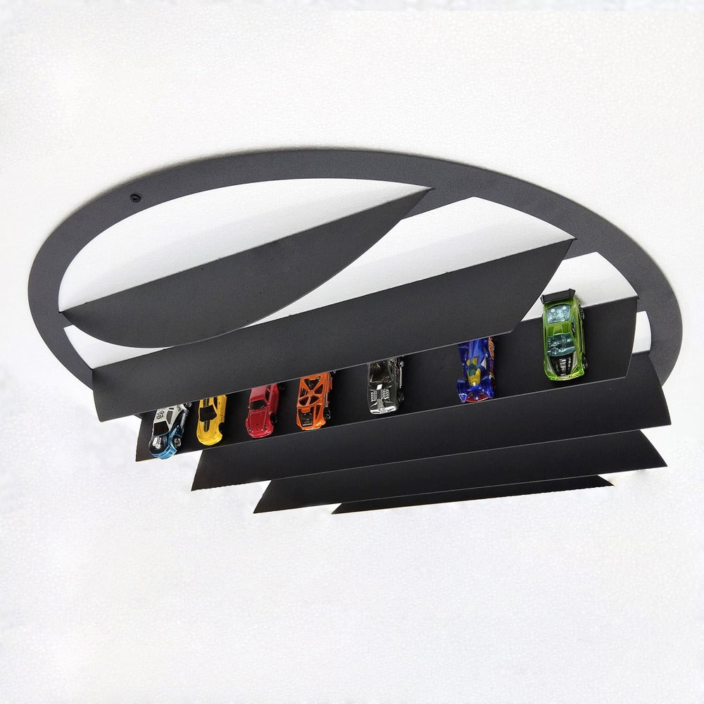 Round metal wall-mounted shelf for showcasing and storing model cars.