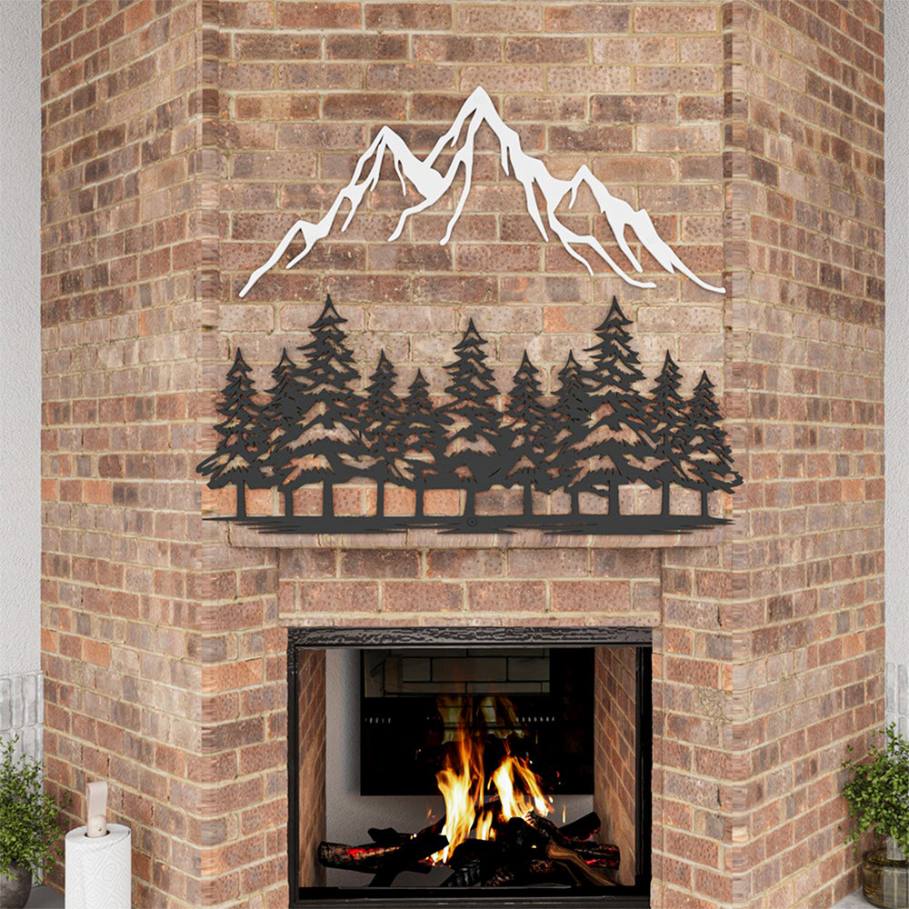 Rustic mountain and pine tree metal wall art above a fireplace.