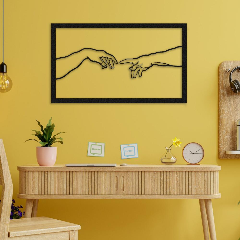 Black Creation of Adam Metal Wall Art in an office