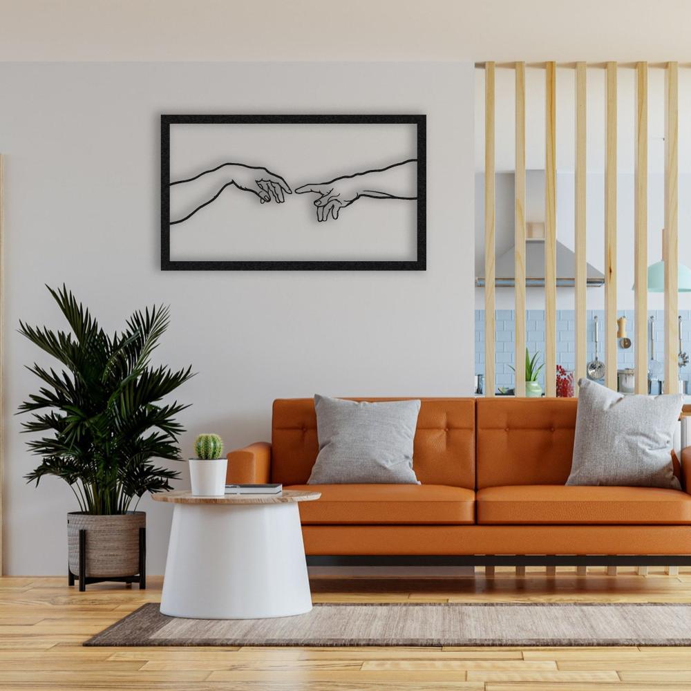 Black Creation of Adam Metal Wall Art in a living room