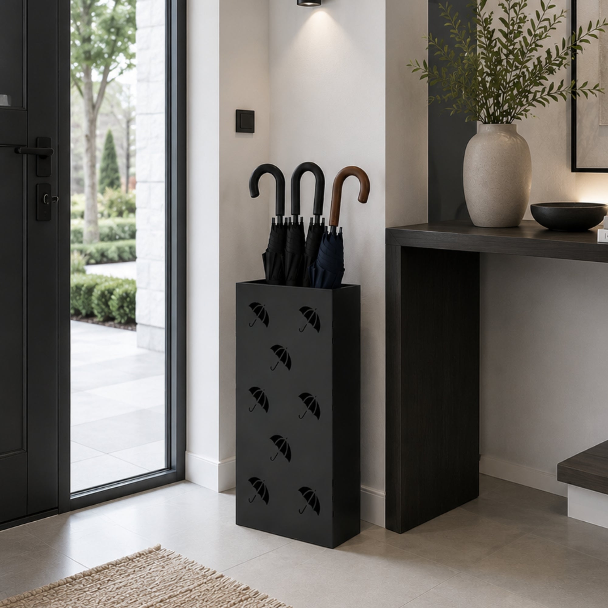 Modern white metal umbrella stand with repeating umbrella pattern in contemporary entryway