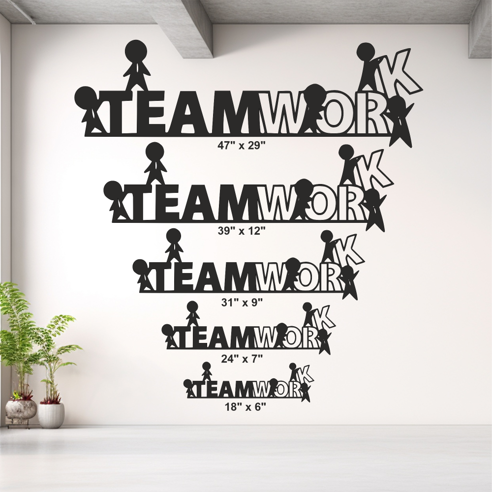 Set of 'TEAMWORK' wall decal designs in various sizes on a white wall.