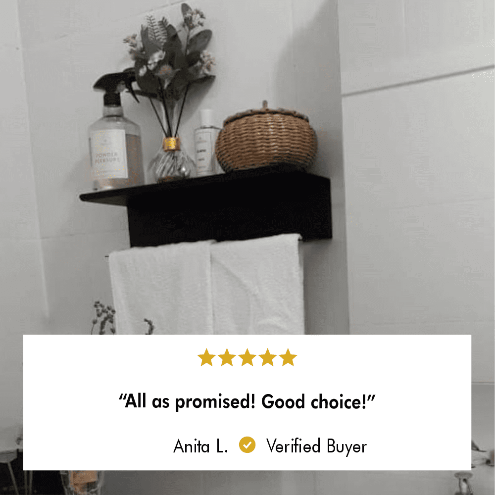 Towel Holder and Shelf mounted in a modern bathroom setting.